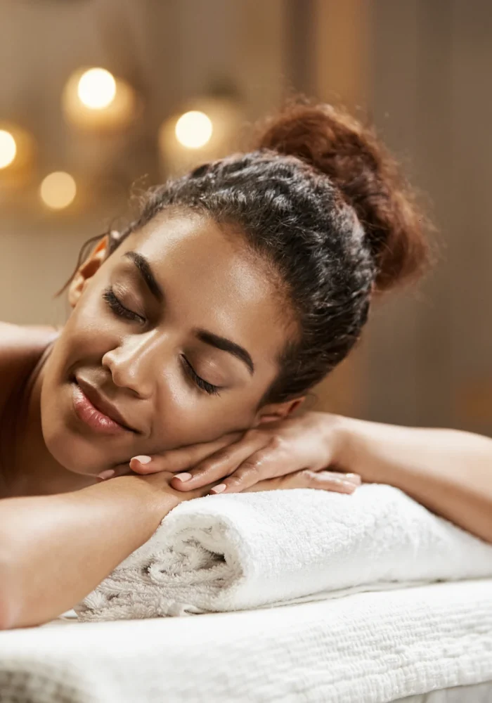 beautiful-african-woman-resting-relaxing-spa-resort-with-closed-eyes